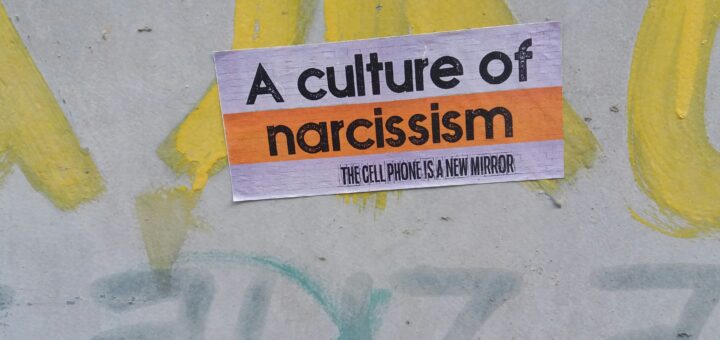 A bumpersticker with words A Culture of Narcissism